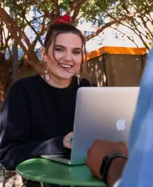 Girl behind laptop